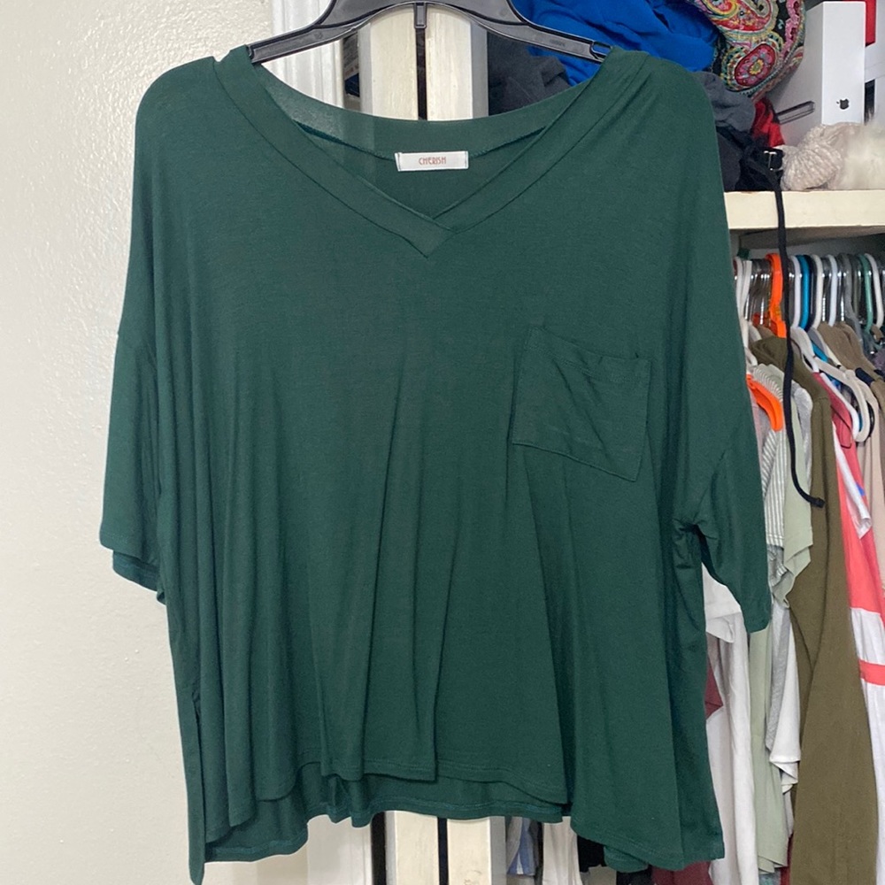 Loose fitting army green top. Never worn